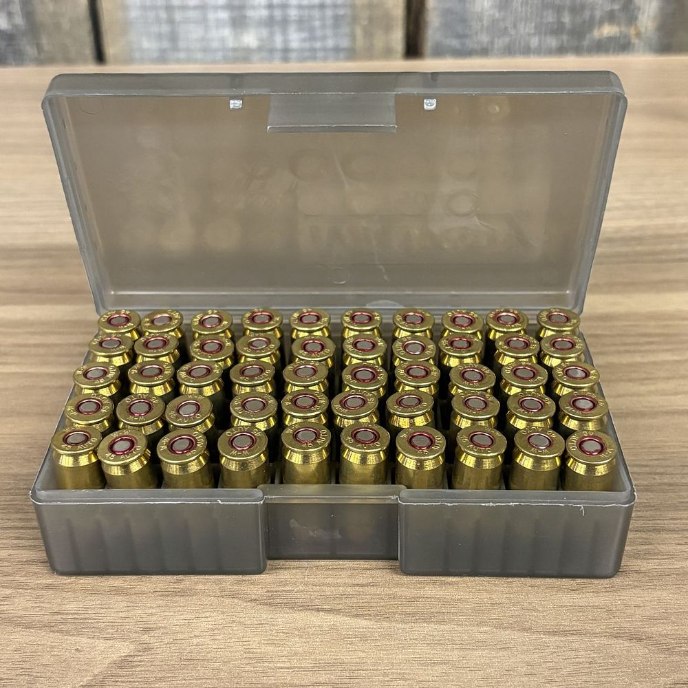 Lot 487: A Group of Winchester Western .45 Auto Handgun Cartridges in a Midway Storage Case
