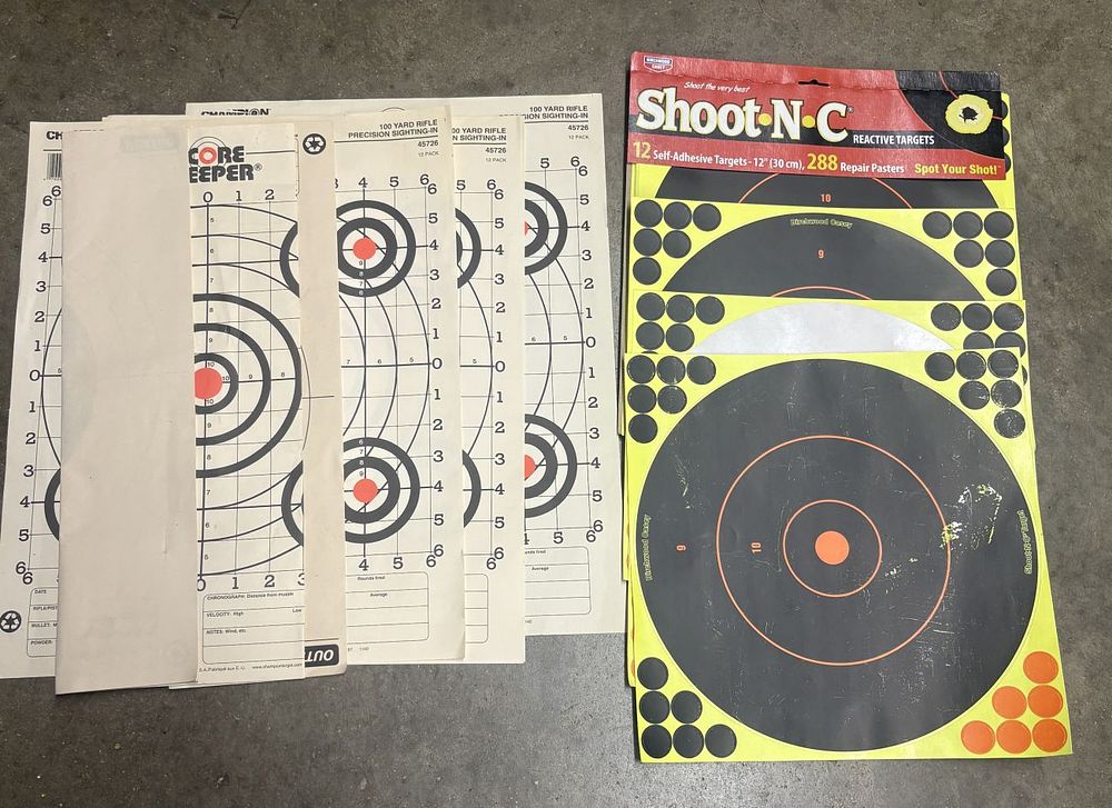 Lot 520: A Collection of Shooting Targets Including Champion Precision Sighting-In and Birchwood Casey Shoot-N-C Reactive Targets