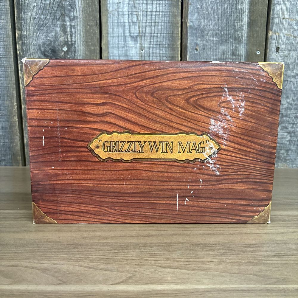 Lot 534: A Group of L.A.R. Grizzly Win Mag Pistol Packaging and Accessories