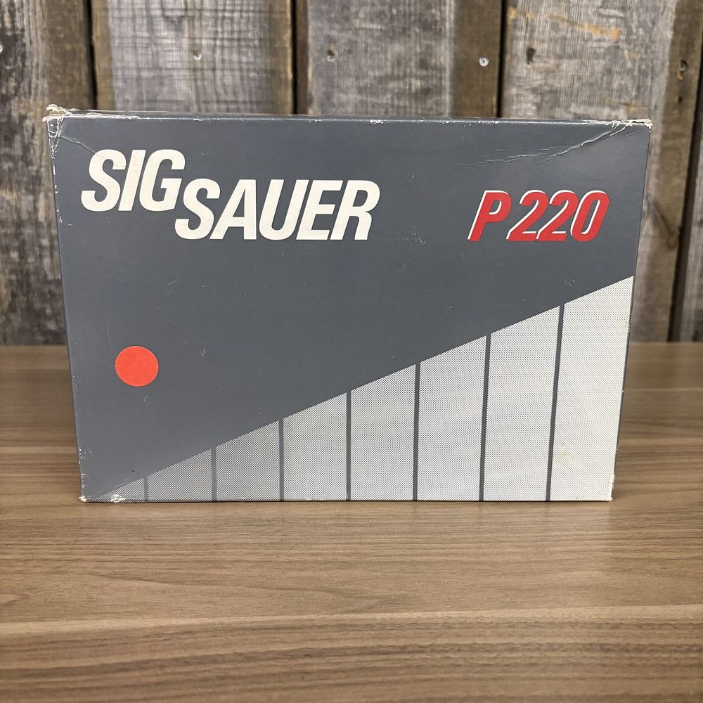 Lot 543: A Group of Sig Sauer P220 Factory Packaging and Paperwork