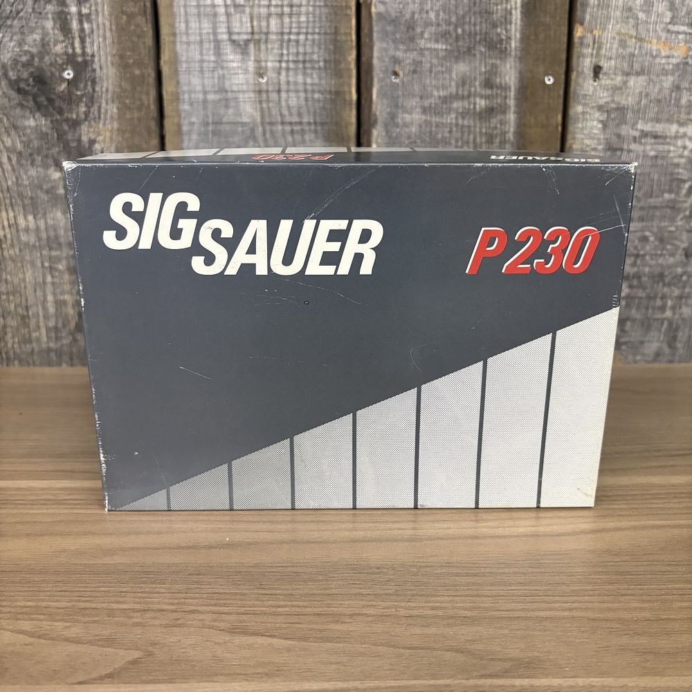 Lot 544: SIG SAUER P230 Factory Box with Test Target