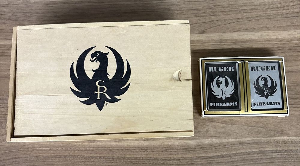 Lot 547: A Ruger Firearms Set of Playing Cards in a Wooden Sliding Lid Box