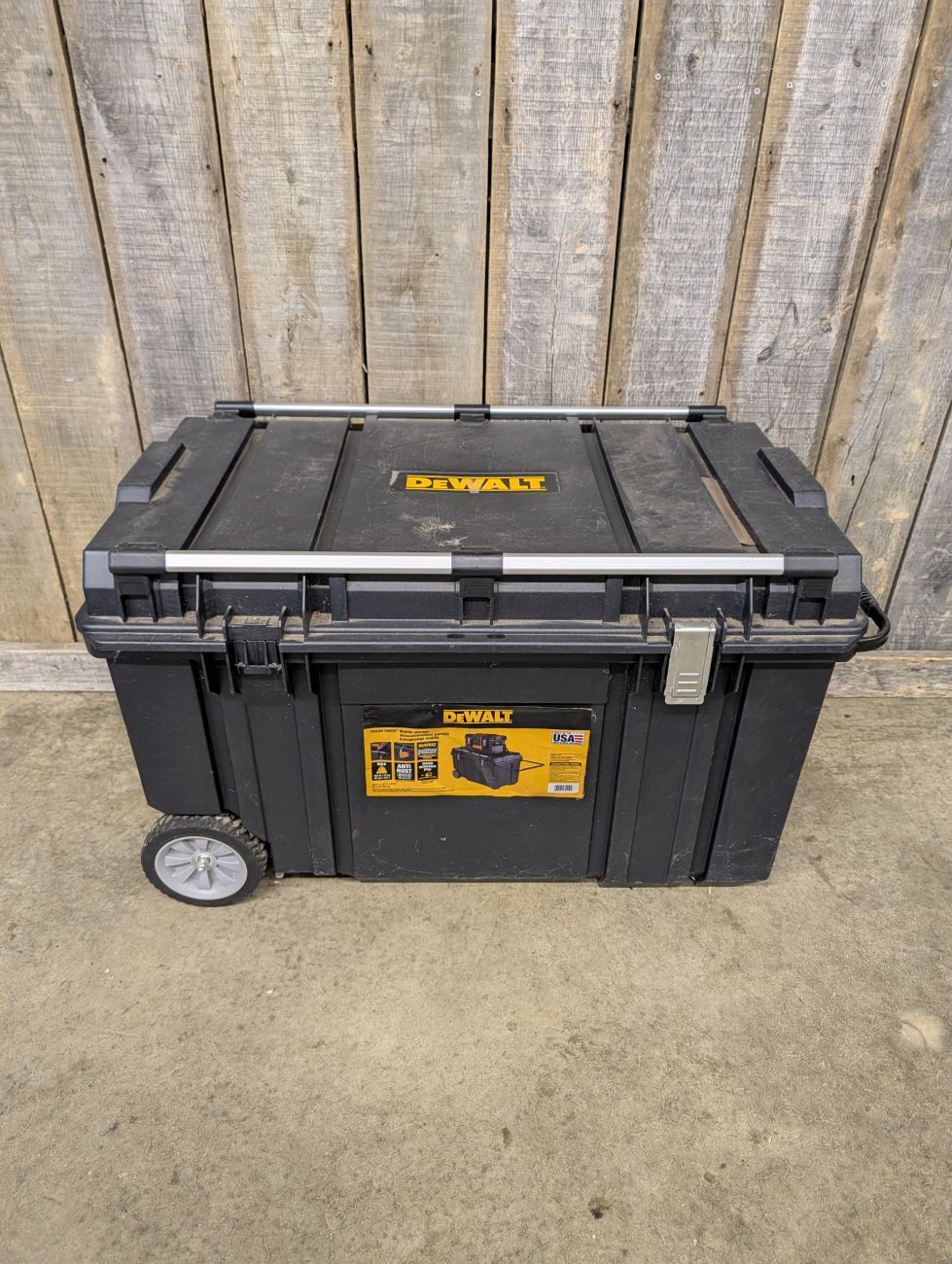 Lot 717: DeWALT Tough Chest 63 Gallon Polypropylene Rolling Tool Box
