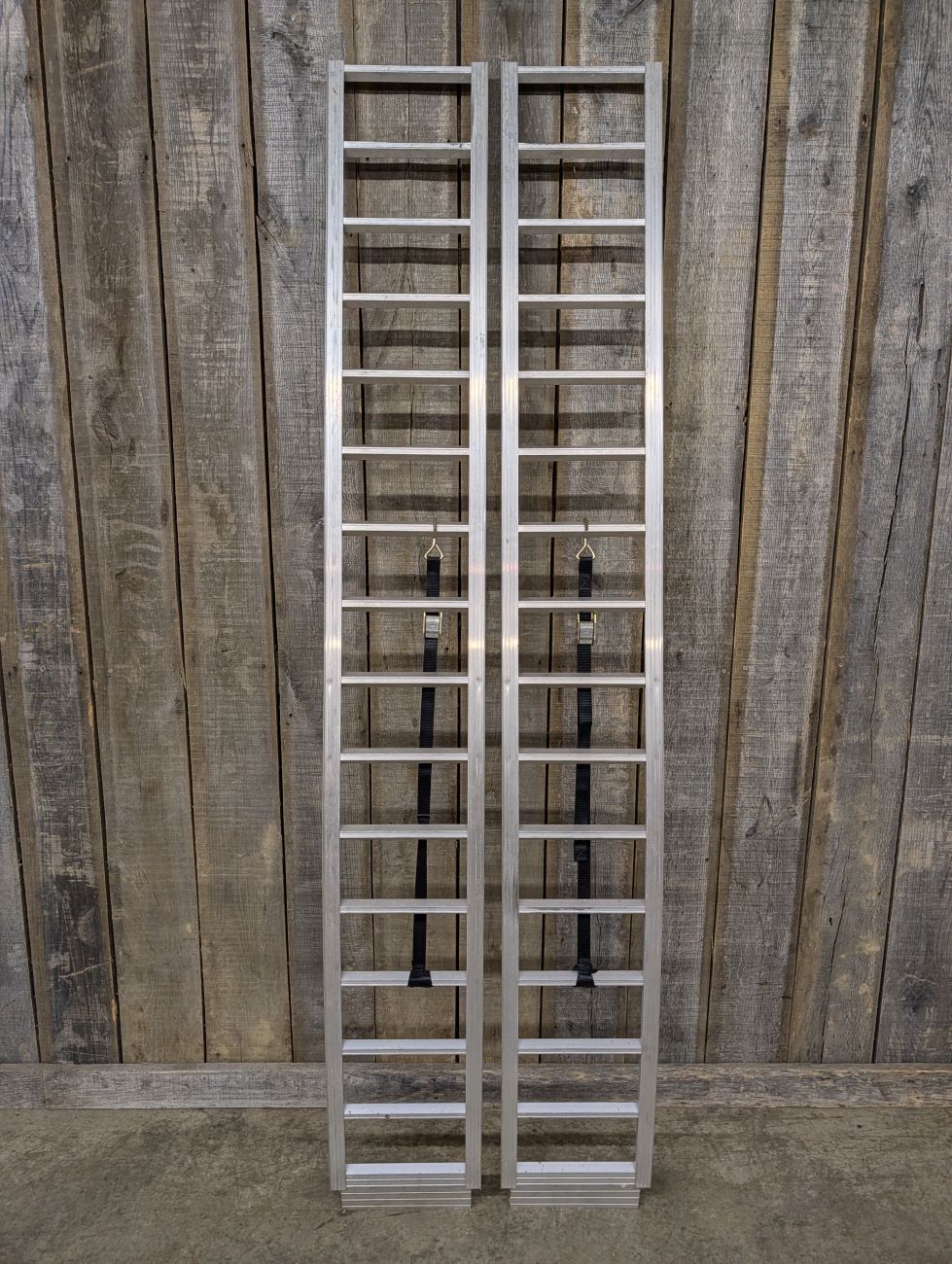 Lot 718: A Pair of Aluminum Arched Loading Ramps with Safety Straps