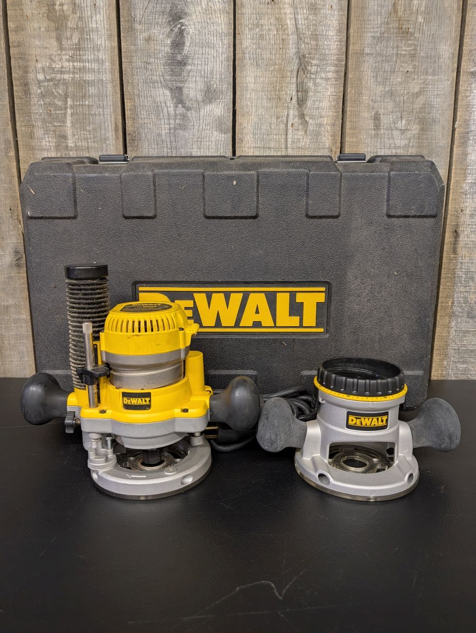 Lot 728: DeWALT DW616 1 3/4 HP Router Kit with Fixed and Plunge Bases and Case