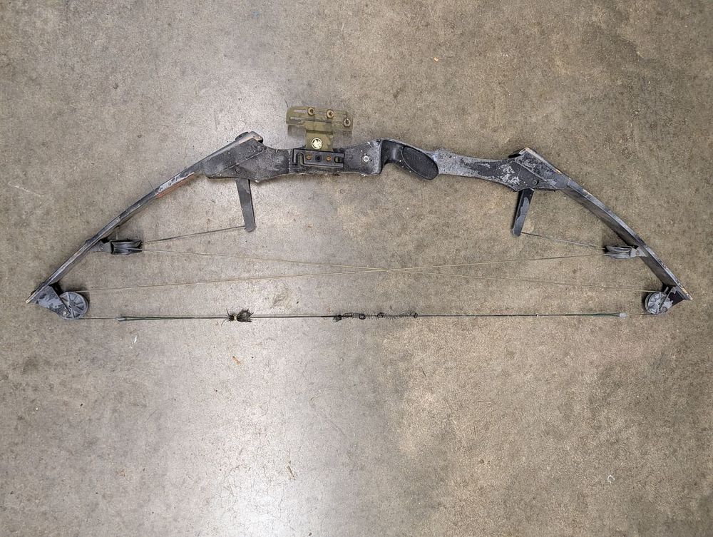 Lot 730: Vintage Bear Whitetail Compound Bow with Four Pulley System