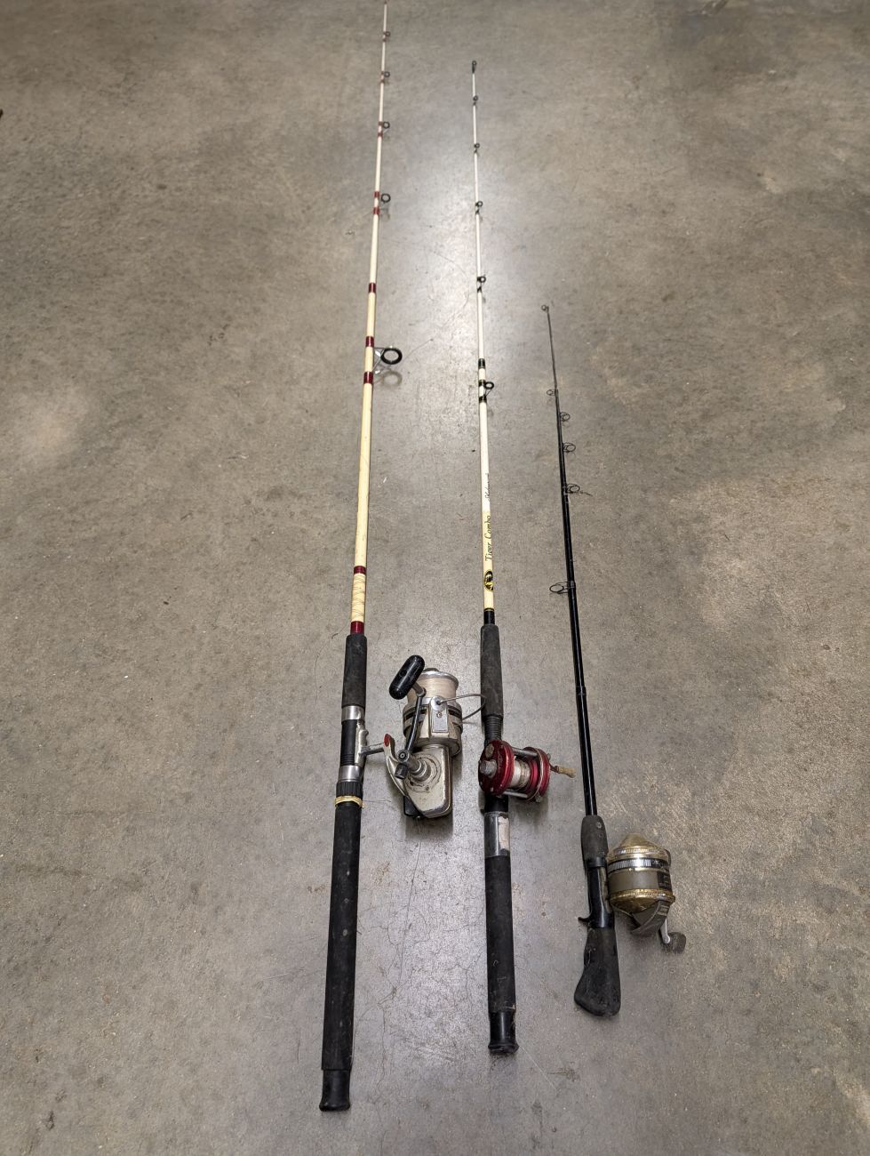 Lot 741: Three Vintage Fishing Rod and Reel Combinations Including ABU Ambassadeur 5000