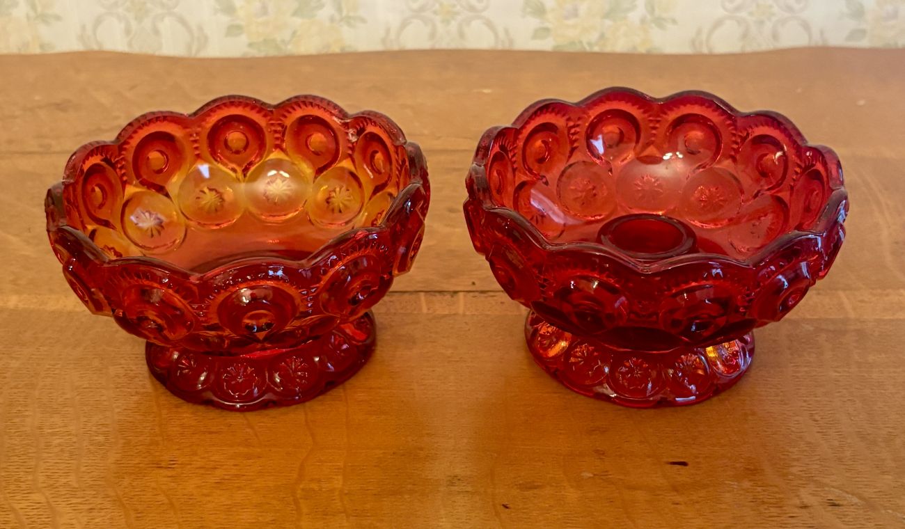 A Pair of Amberina Glass Moon and Star Pattern Table Articles