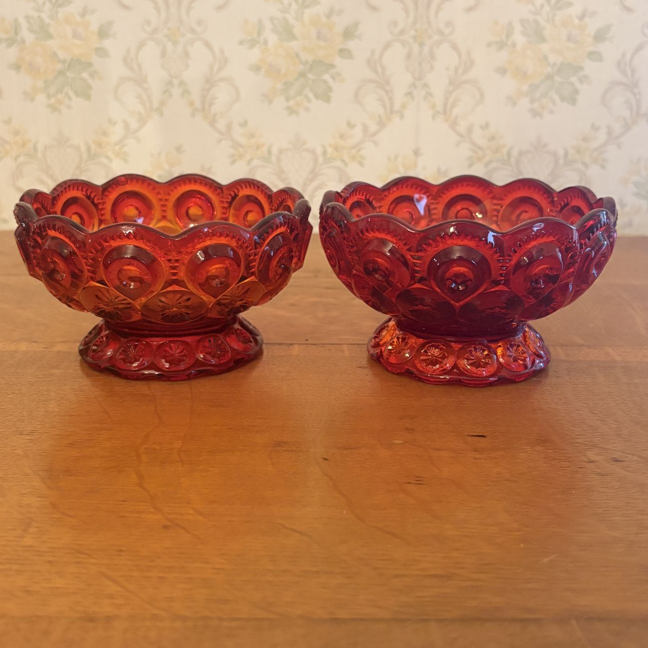 A Pair of Amberina Glass Moon and Star Pattern Table Articles