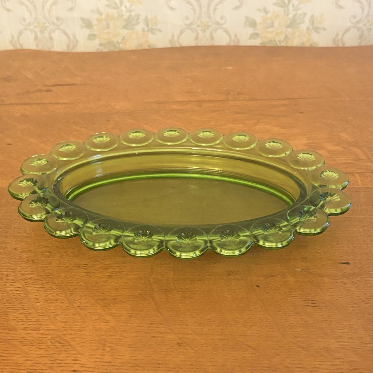 Pressed Green Glass Covered Butter Dish in Moon and Star Pattern