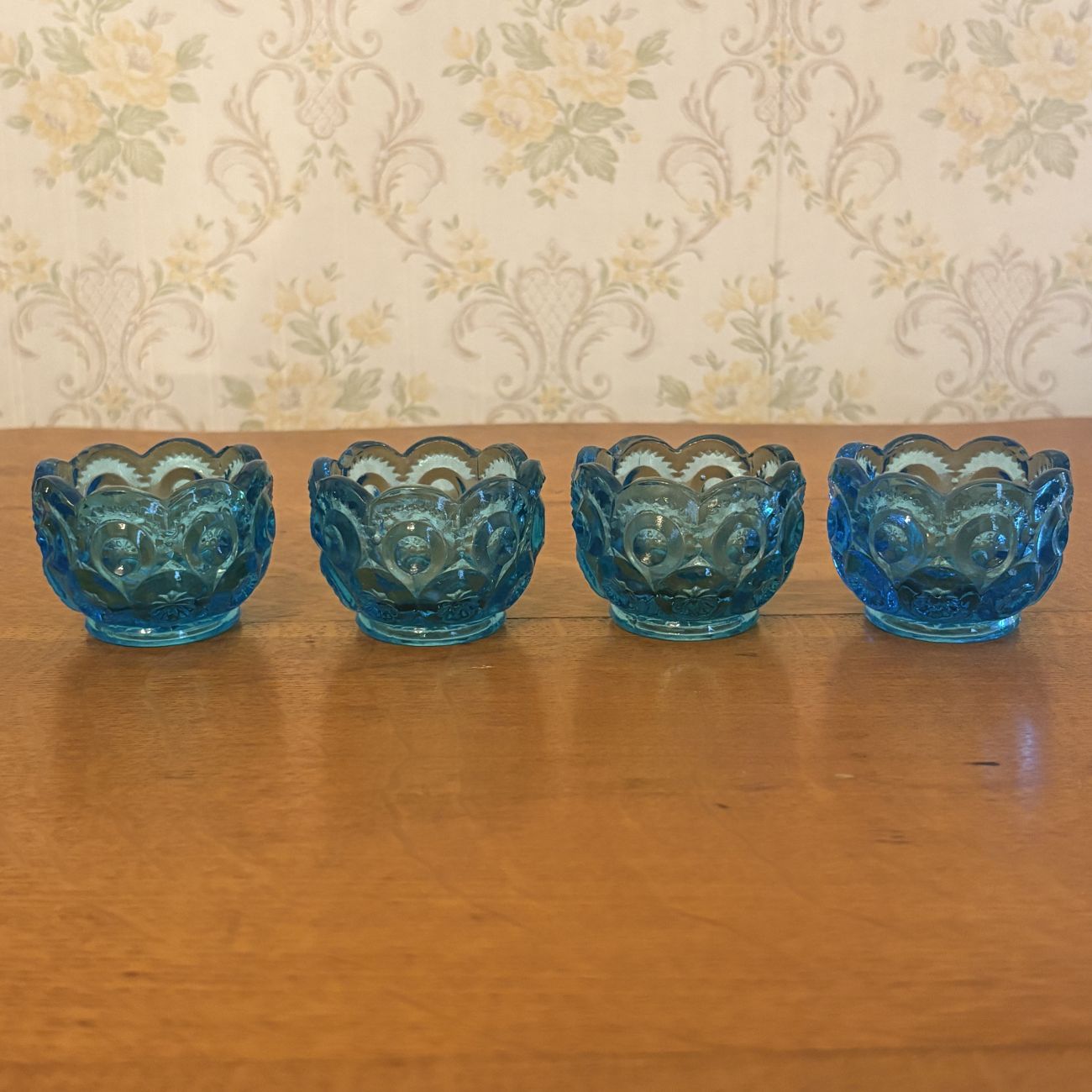 A Set of Eight Moon and Star Pattern Blue Pressed Glass Salt Cellars