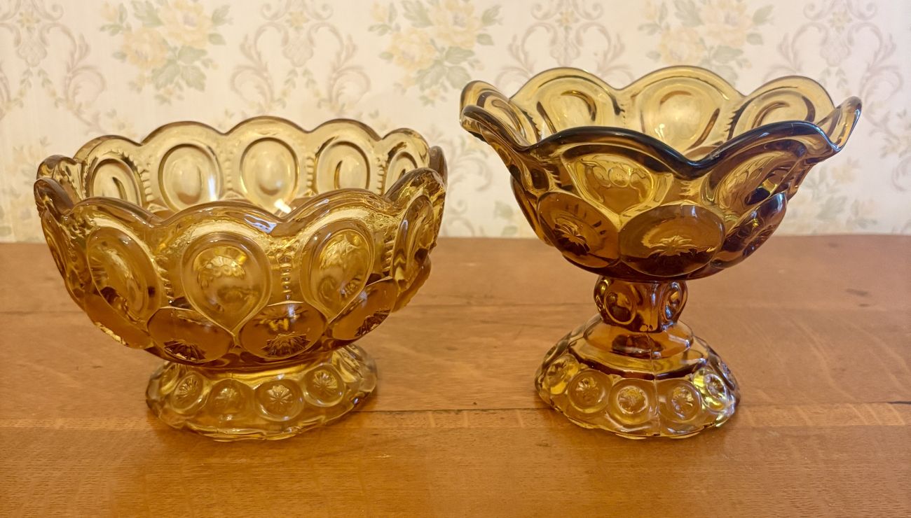 A Pair of Amber Pressed Glass Compotes in the Moon and Star Pattern