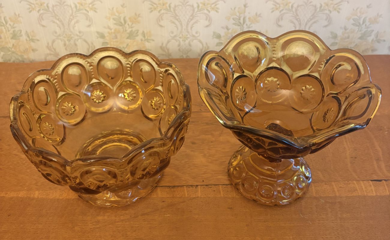 A Pair of Amber Pressed Glass Compotes in the Moon and Star Pattern