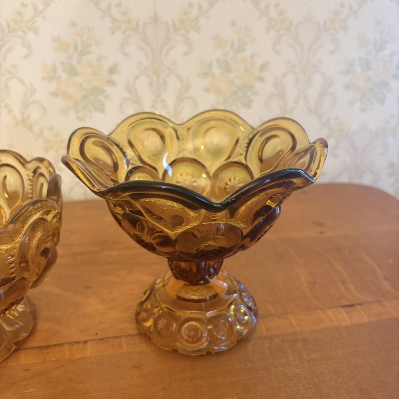 A Pair of Amber Pressed Glass Compotes in the Moon and Star Pattern