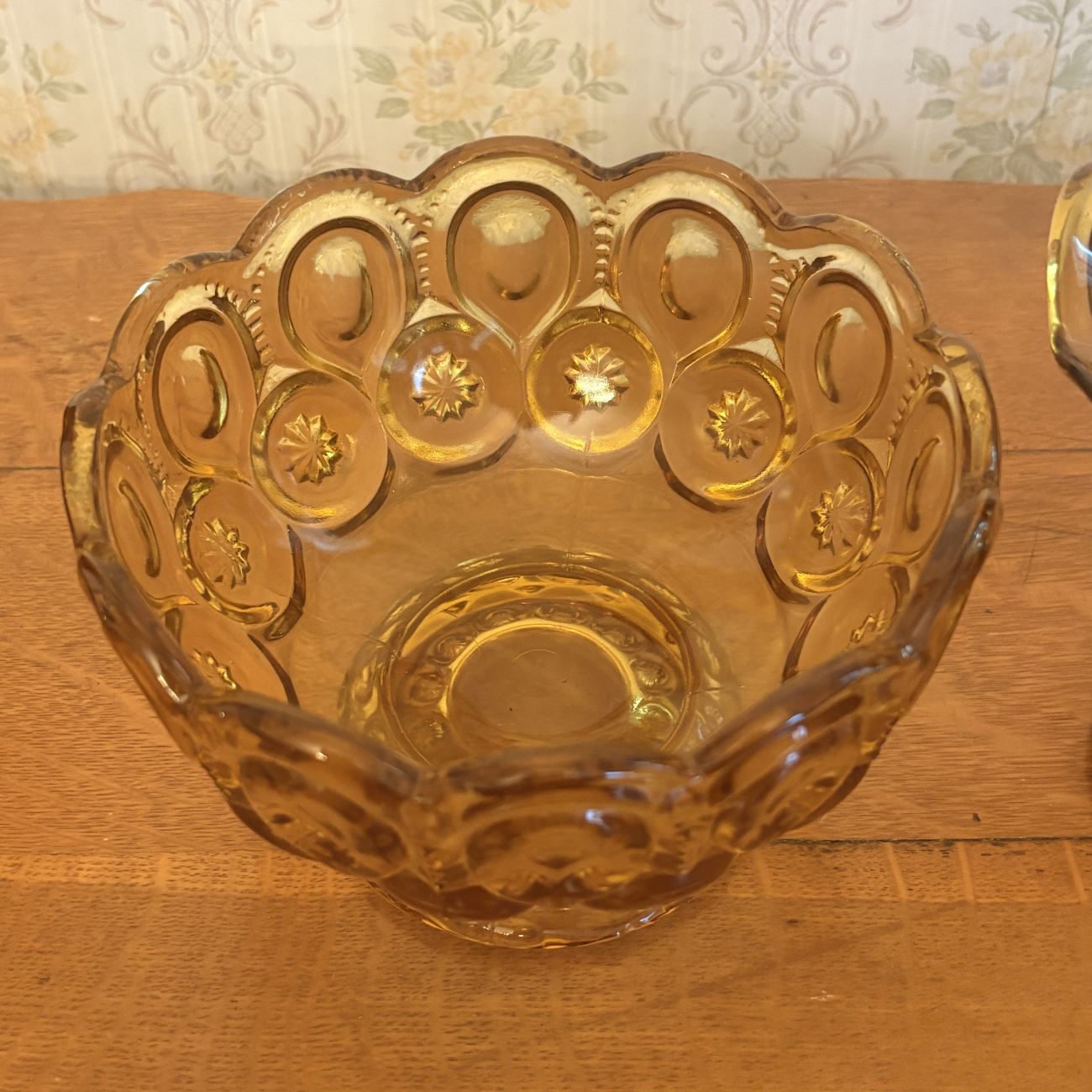 A Pair of Amber Pressed Glass Compotes in the Moon and Star Pattern