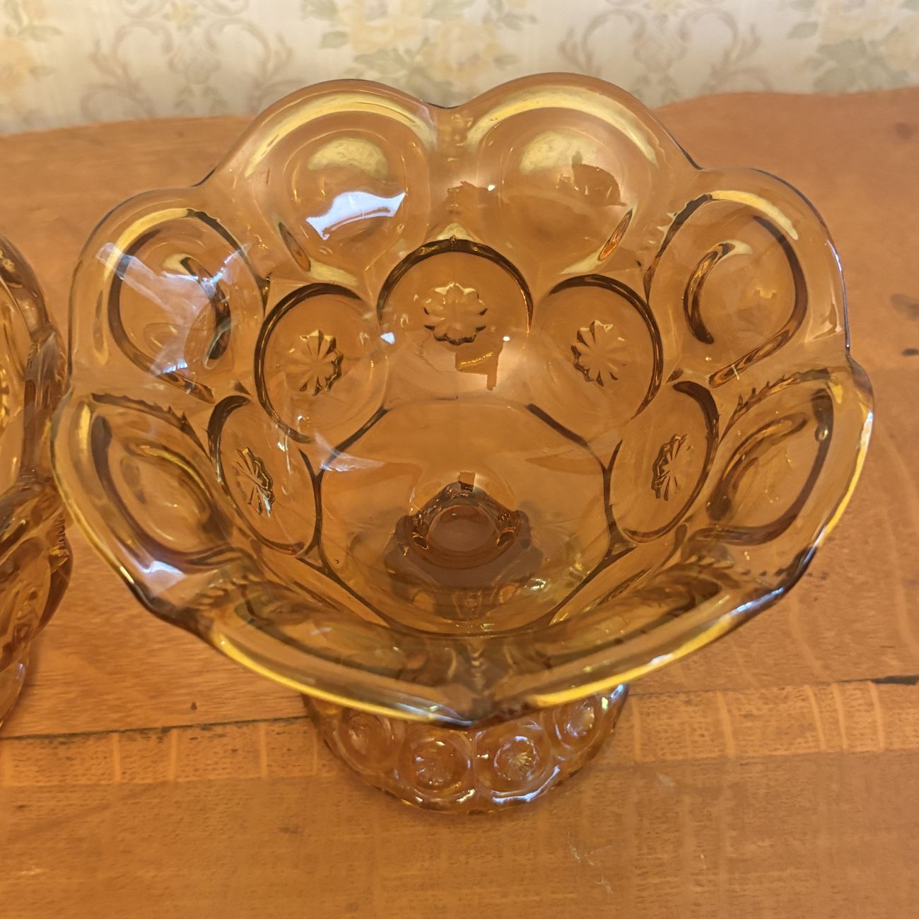 A Pair of Amber Pressed Glass Compotes in the Moon and Star Pattern