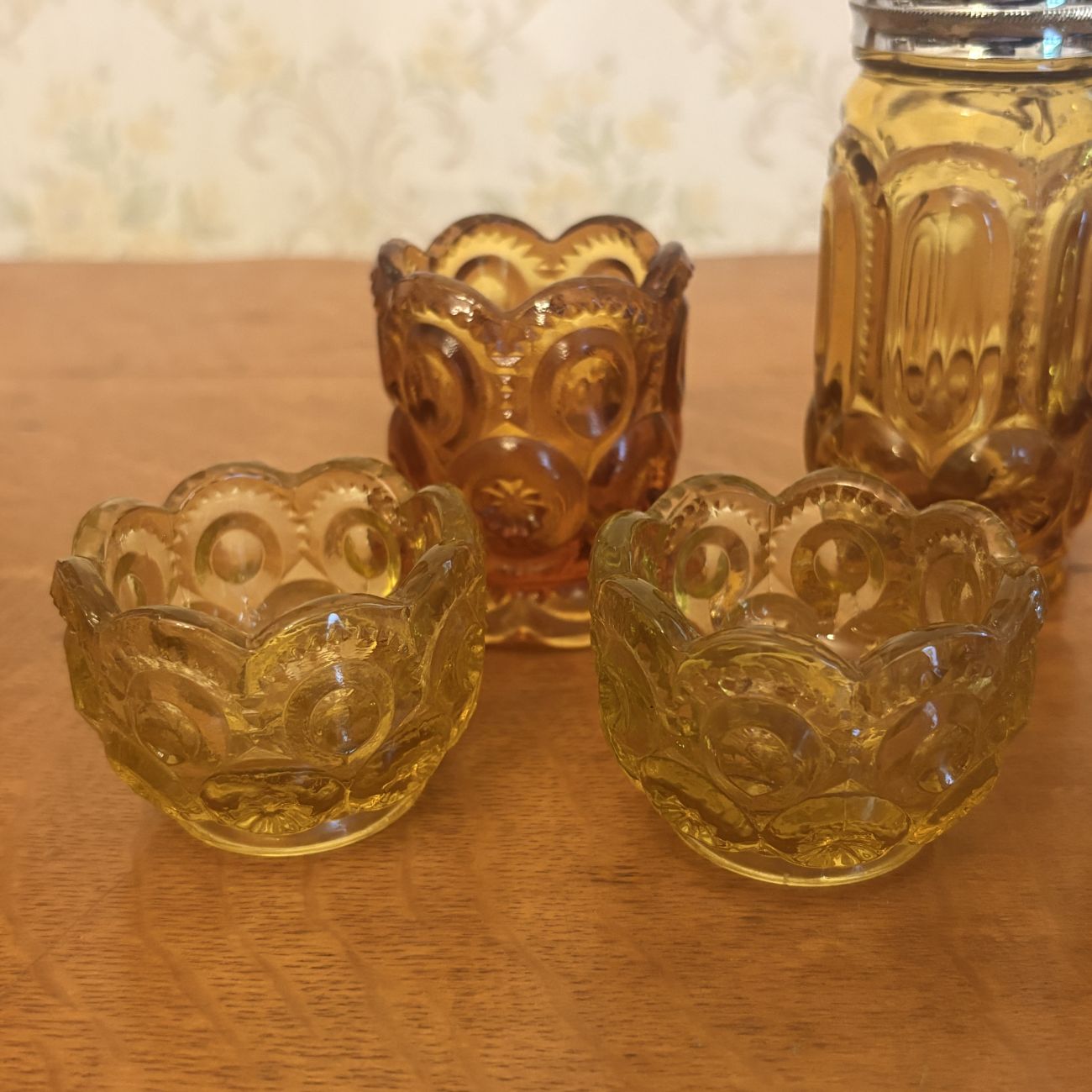 A Set of Amber Pressed Glass Moon and Star Pattern Tableware