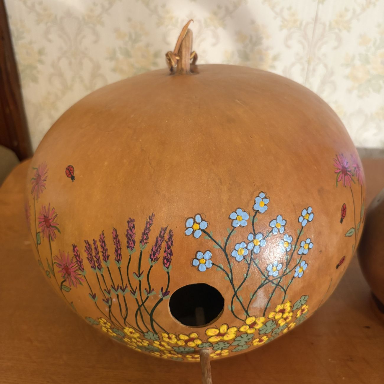 Two Decorative Dried Gourd Objects Including Hand Painted Birdhouse and Pitcher