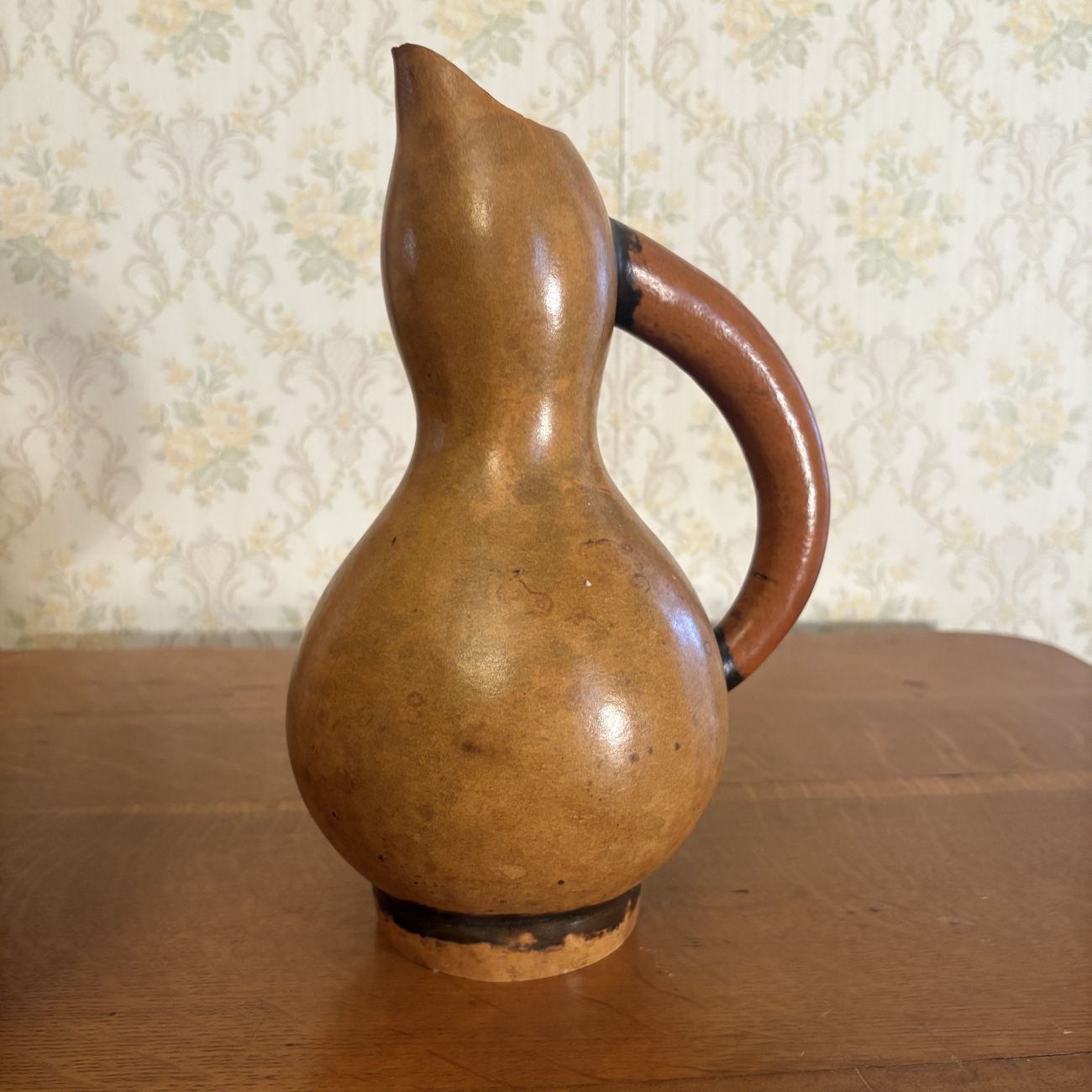 Two Decorative Dried Gourd Objects Including Hand Painted Birdhouse and Pitcher