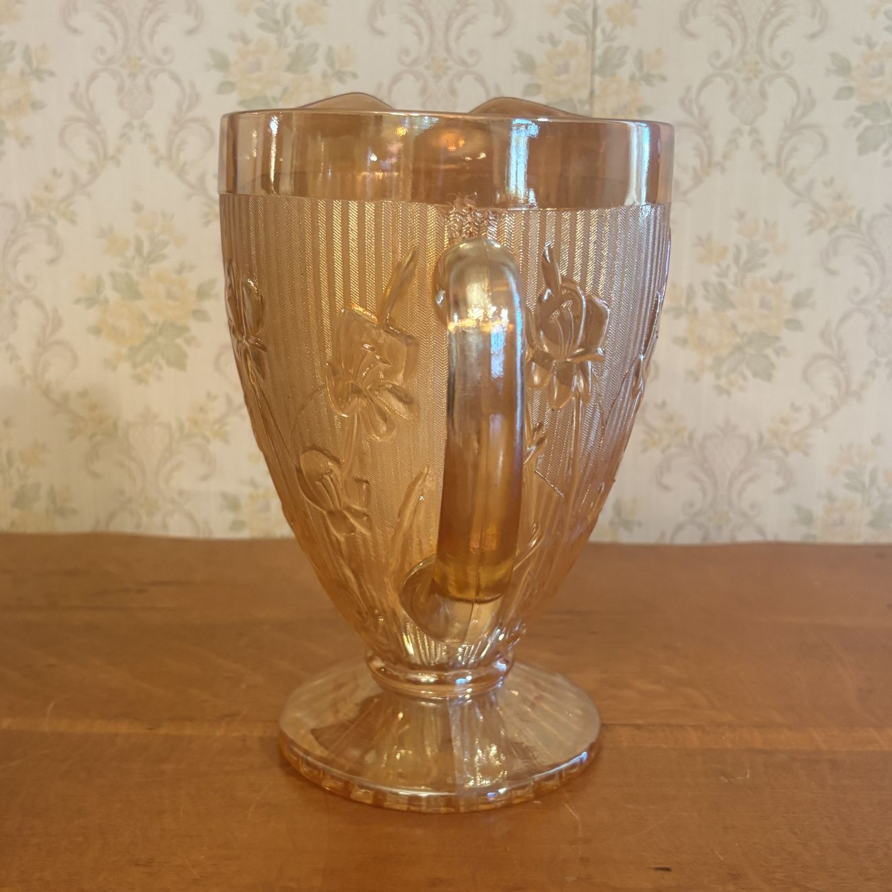 Marigold Iridescent Iris and Herringbone Pattern Glass Footed Pitcher