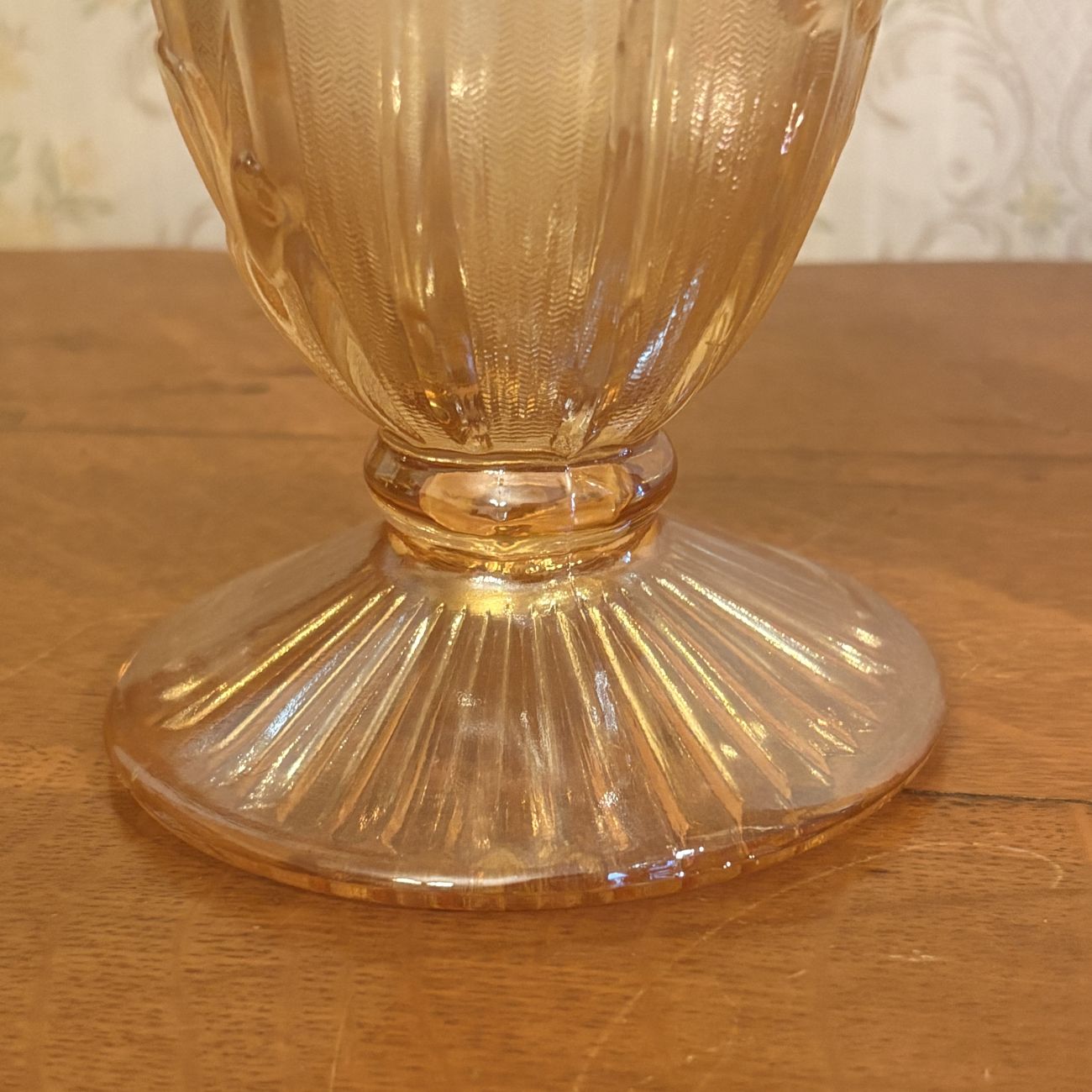 A Pair of Marigold Carnival Glass Footed Vases in Iris and Herringbone Pattern