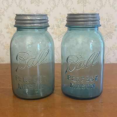 A Pair of Ball Perfect Mason Blue Glass Quart Canning Jars with Zinc Lids. A pair of antique 