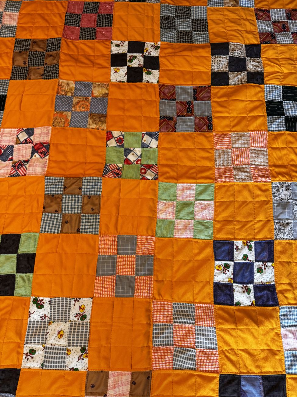American Patchwork Nine-Patch Scrap Quilt with Saffron Ground