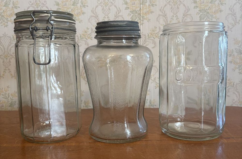 Lot 276: Three Vintage Clear Glass Kitchen Jars Including Kraft and Coffee Embossed Examples