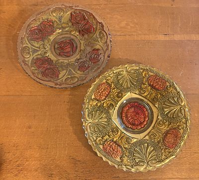 Two American Goofus Glass Plates in Rose and Dahlia Patterns. This lot consists of two antique 