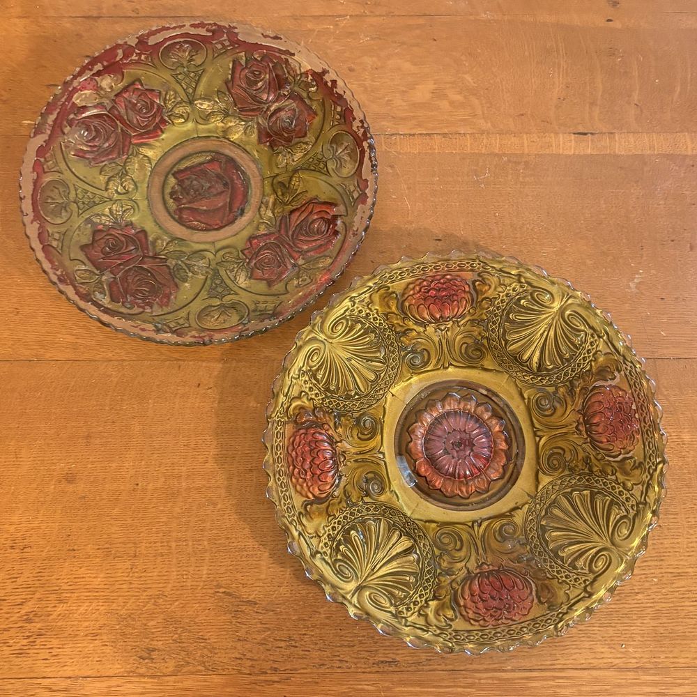 Lot 287: A Pair of Large Goofus Glass Plates with Relief Molded Floral Motifs