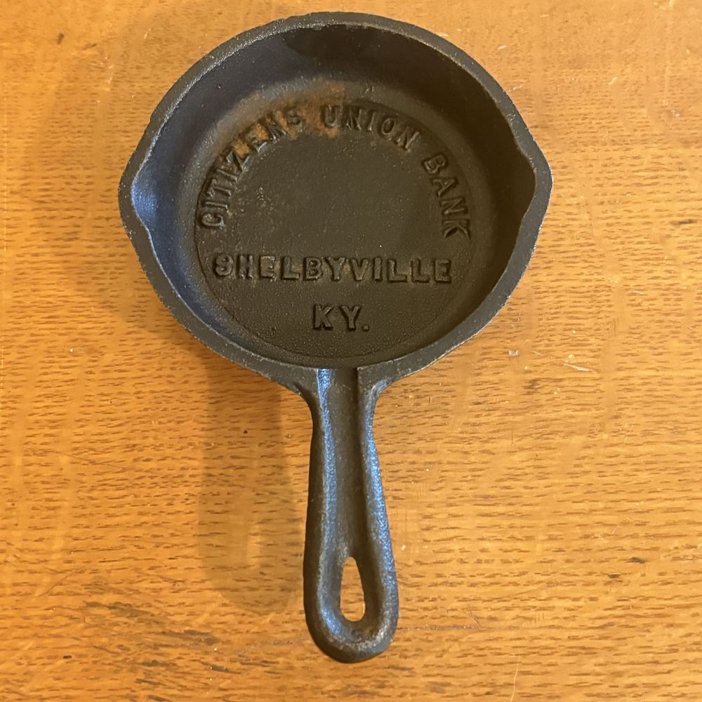 Lot 293: Citizens Union Bank Shelbyville Kentucky Miniature Cast Iron Advertising Skillet