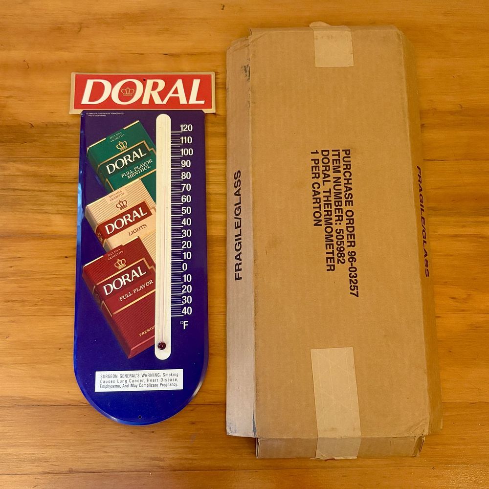 Lot 325: Vintage 1996 Doral Cigarettes Metal Advertising Thermometer with Original Shipping Box