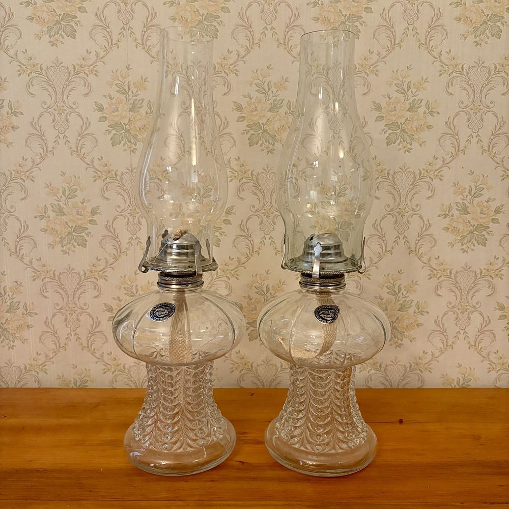 Lot 327: A Pair of Lamplight Farms Clear Pressed Glass Kerosene Lamps