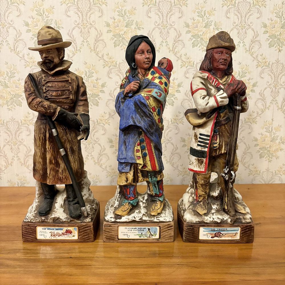 Lot 383: Three McCormick C.M. Russell Whiskey Decanters The Stage Driver The Trapper and Flathead Squaw