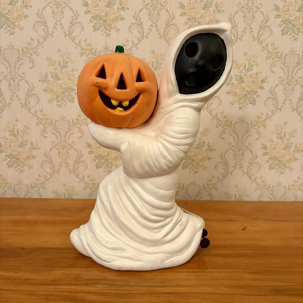 Lot 389: Vintage Ceramic Light Up Ghost Holding Jack O Lantern Halloween Figurine