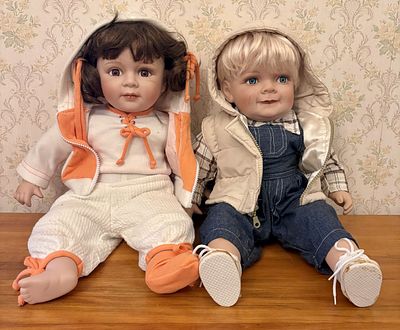 A Pair of Royal Cathay Collection Limited Edition Porcelain Contemporary Dolls. A pair of 