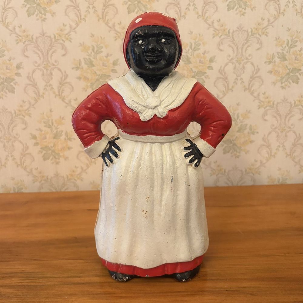 Lot 401: Cast Iron Black Americana Still Bank