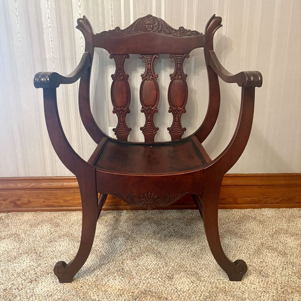 Lot 417: Antique Carved Mahogany Curule Form Armchair with Mascaron Crest