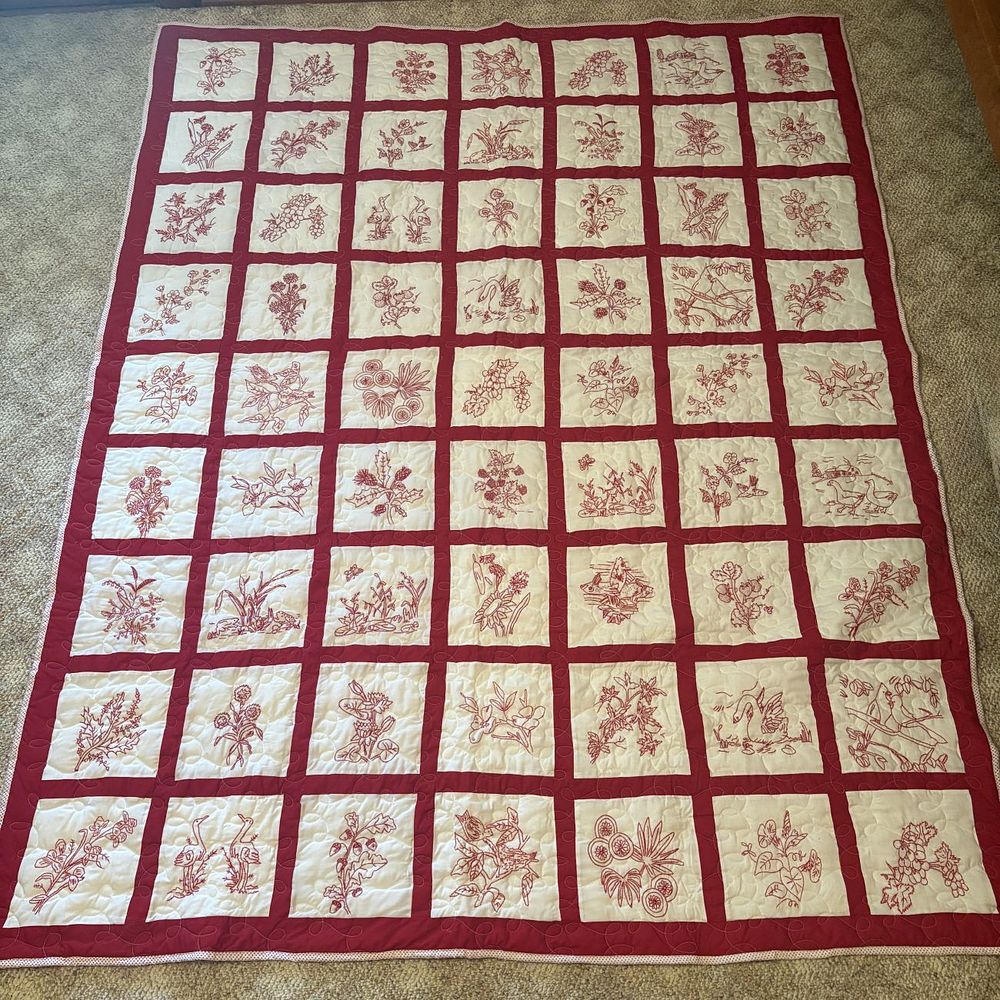 Lot 425: Large Handmade Redwork Embroidery Quilt with Floral and Animal Motifs