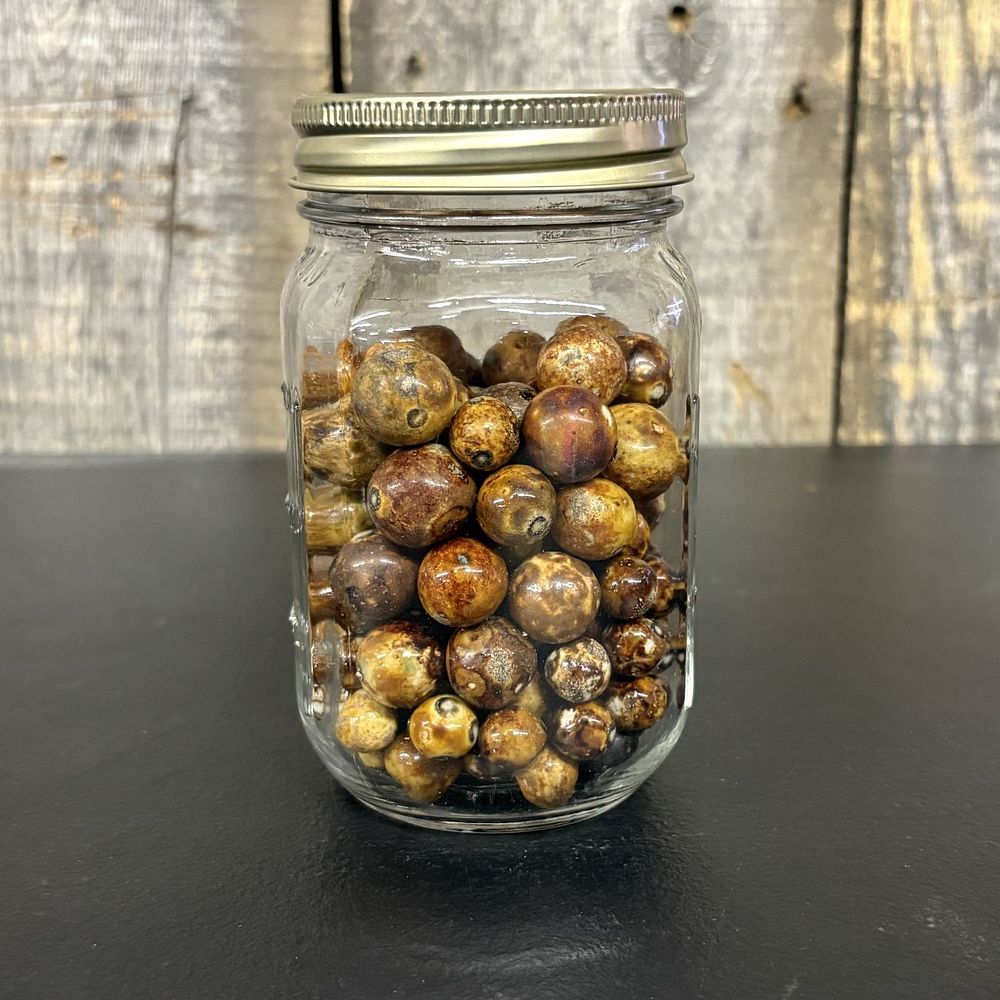 Lot 439: A Collection of Vintage Glass Marbles in a Clear Glass Mason Jar