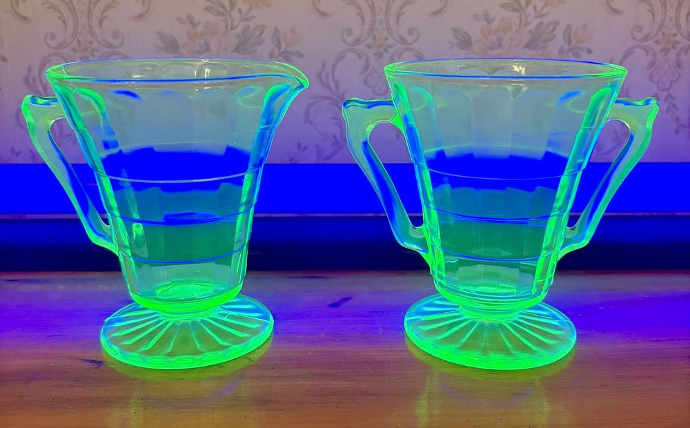 Lot 477: A Pair of Green Depression Glass Block Optic Footed Creamer and Sugar Bowl