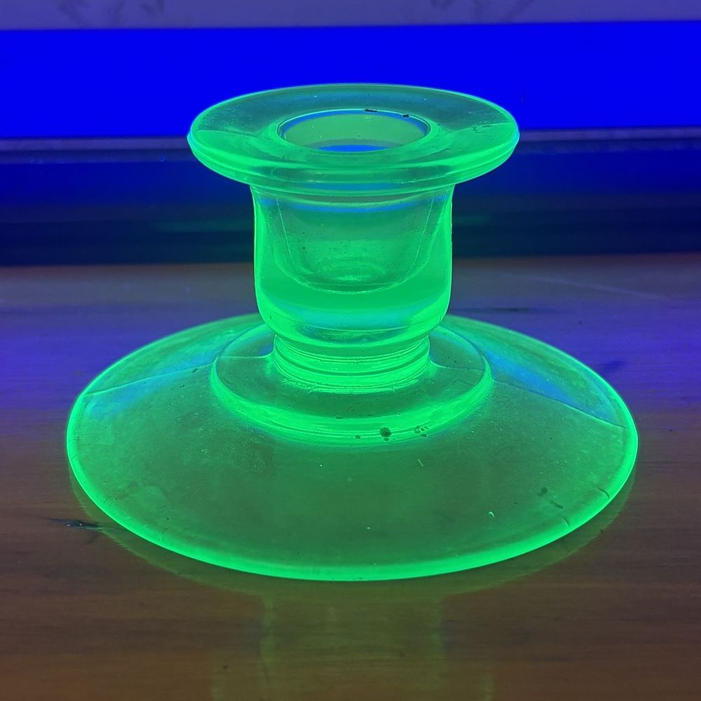 Lot 485: A Vintage Green Uranium Glass Candlestick Holder