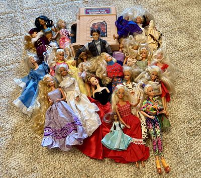 A Collection of Twenty-Five Mattel Fashion Dolls and Glamour Gals Showplace Playset. This group 