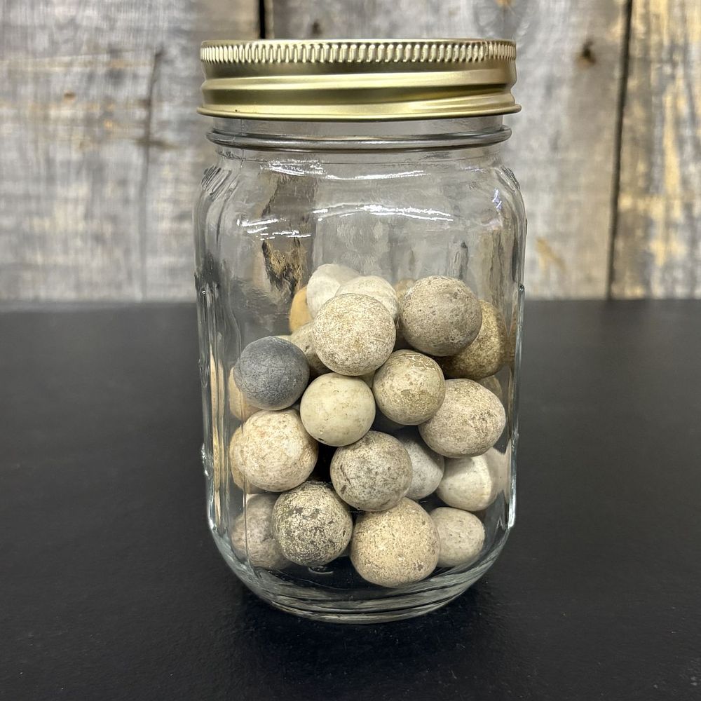Lot 664: A Collection of Antique Clay Marbles in a Glass Canning Jar