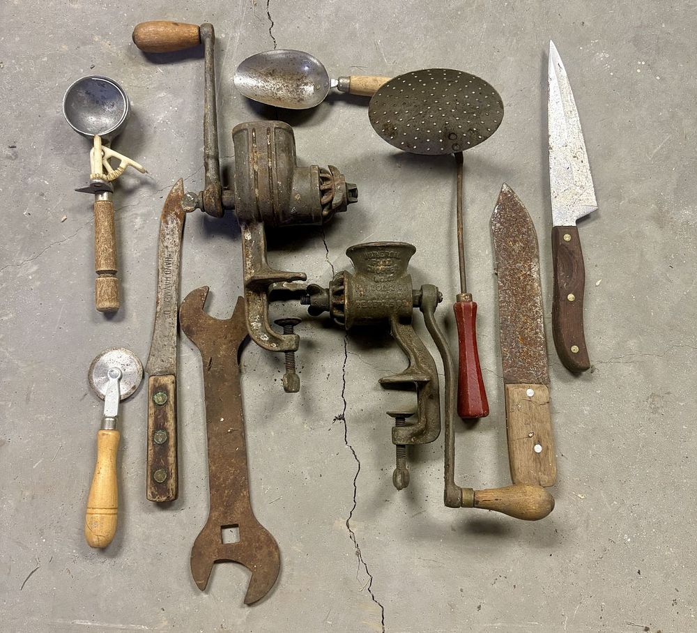 Lot 671: Assortment of Antique and Vintage Cast Iron Food Choppers and Hand Tools