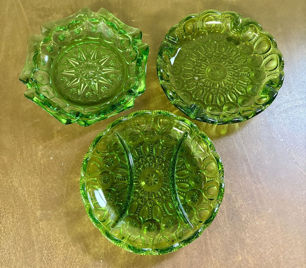 Lot 690: Three Pieces of Emerald Green Pressed Glass in the Moon and Star Pattern