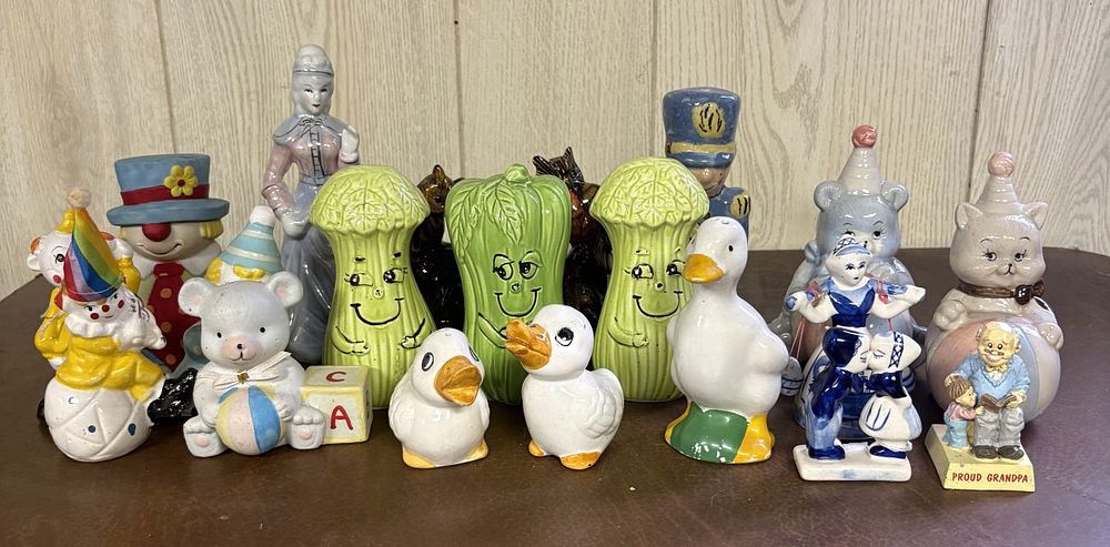Lot 696: A Collection of Approximately 18 Vintage Ceramic and Porcelain Figurines and Salt and Pepper Shakers