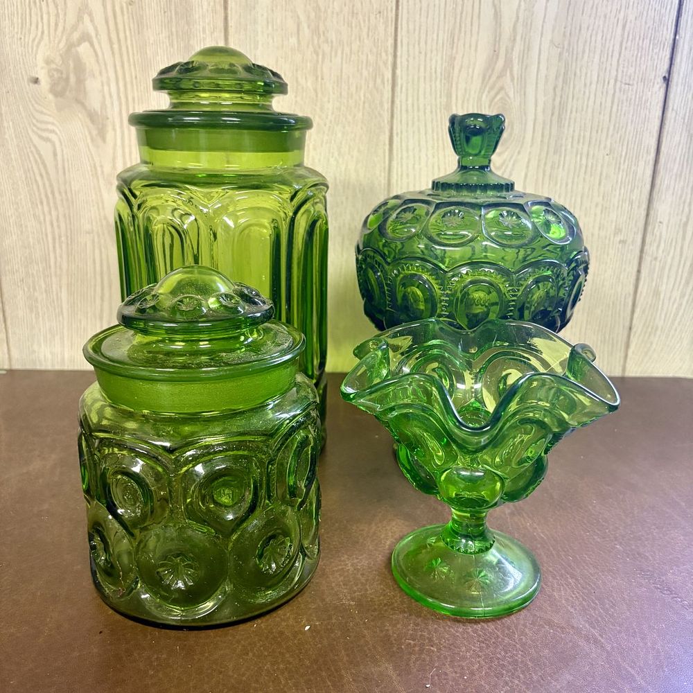 Lot 701: A Collection of Emerald Green Moon and Star Pattern Pressed Glass Tableware
