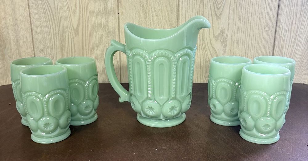 Lot 702: A Set of Westmoreland Jadeite Glass Moon and Star Pattern Drinkware