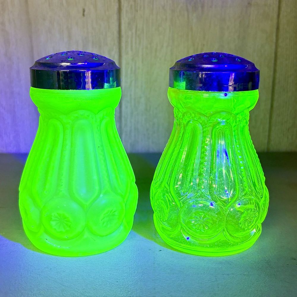 Lot 762: Uranium Glass Moon & Star Set: Signed Salt & Pepper Shakers & Lidded Dresser Box